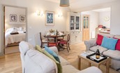 Barley Hill Cottage - open-plan living space and kitchen leading through to bedroom two