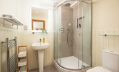 Old Granary House - en suite of bedroom one featuring a corner shower with rainforest head and separate mixer