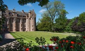 Thirlestane Castle - a lawned garden sits to the rear of the castle