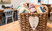 Chestnut Cottage - the welcome basket filled with goodies awaits guest arrival