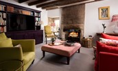 Old Purves Hall - cosy drawing room with large Smart TV and selection of books