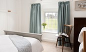 Appletree Cottage - bedroom one with views over the rear garden