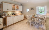 Gardener's Cottage - open-plan kitchen and dining area with seating for six guests