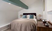 Priory Cottage - first floor bedroom with king size bed and chest of drawers