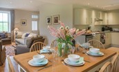 Pathhead Farmhouse - dining table in open plan living area