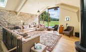 Williamston Barn & Cowshed - sitting room with wood burning stove
