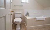 Hamilton House - ground floor en suite bathroom with bath, WC and basin
