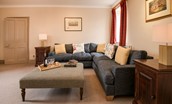 Bowmont Cottage - large corner sofa in the sitting room