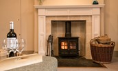 Bowmont Cottage - enjoy a glass of wine by the wood burning stove
