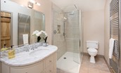 Crookhouse Mill - bedroom four en suite bathroom on the first floor with large walk-in shower, WC and basin