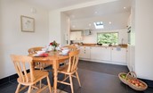 Garden Cottage - kitchen and dining area with seating for four guests