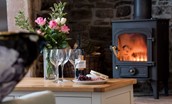 Curlew Cottage - enjoy cheese and wine by the wood burning stove