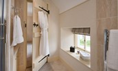 Dryburgh Stirling One - bedroom one en suite bathroom with walk-in shower, guest robes, WC and basin