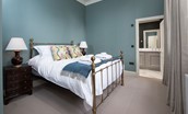 The Maitland Apartment - bedroom one with en suite bathroom access
