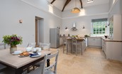 Beeswing - spacious kitchen with island and dining table with seating for six guests