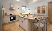 Beeswing - kitchen island with breakfast bar and seating for two guests