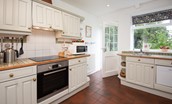 Milfield Hill Cottage - kitchen with ceramic hob