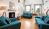 The Five Turrets - sitting room area with large wood burner