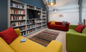 The Five Turrets - mezzanine with library and Smart TV