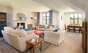 Lindisfarne View - the sitting room with dining area is a lovely spot to take in the views