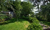 The Old School, Hume - tranquil garden with trees, shrubs and lawned areas