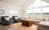 Riverhill Cottage - generous sofa and two armchairs in the large open plan living space