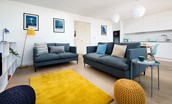 2 The Bay, Coldingham - the open-plan living space provides seating for four