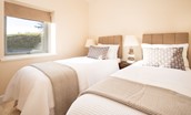 Leyland Barn - bedroom two with zip and link beds, which can be configured as a king size double or twin beds