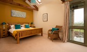 East Lodge - the spacious Master bedroom with a superking double bed and ensuite shower room