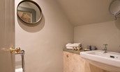 Bughtrig Cottage - bedroom one's en suite shower room with walk-in shower