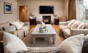 The Stables, Saltcoats Steading - comfortable sitting room with three two-seater sofas, perfect for relaxing evenings with the family