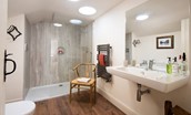 Anvil Cottage - bedroom one en suite with large walk-in shower