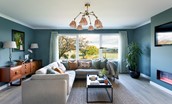 Overthickside - stylish sitting room with large corner sofa, Smart TV and electric fire