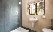Poppy House - en-suite bathroom to master bedroom with large walk in shower