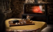 Old Purves Hall - large wood burning stove in the drawing room creating a cosy, relaxed space