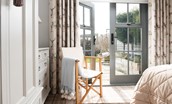 Number Nine, Lanchester - the French doors to the garden from the ground floor bedroom