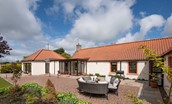 Westwood Cottage - terrace and patio area to the rear with outdoor dining furniture - perfect for al fresco dining