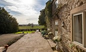 Anvil Cottage - the sunny stone terrace to the front of the cottage