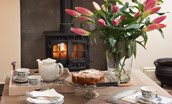 Goose Cottage - tea and cake in front of the cosy wood burner