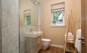 The Coach House, Kingston - shower room with walk-in shower, WC and basin, which sits off the utility room