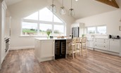 Riverhill Cottage - large kitchen island with seating and wine cooler