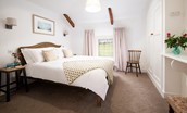 Appletree Cottage - bedroom four with beamed ceiling and views over the garden