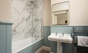 Riverhill Cottage - bedroom four en suite bathroom with shower over the bath