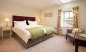 Old Granary House - bedroom one with zip and link beds, configured as a super king double or twin