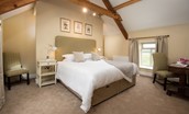 The Granary - bedroom two with beams