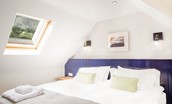 Culdoach Cottage - bedroom three with zip and link super king bed and Velux windows